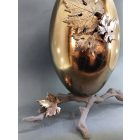 Lábon álló ovál, bronz urna patinázott és bronz levelekkel